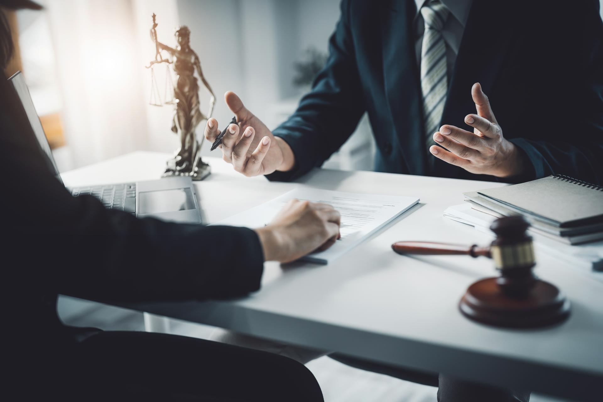 Law, Consultation, Agreement, Contract, Attorney or Lawyer holding a pen  is consulting with a client to explain the pattern of answering questions before going to court to decide a lawsuit.