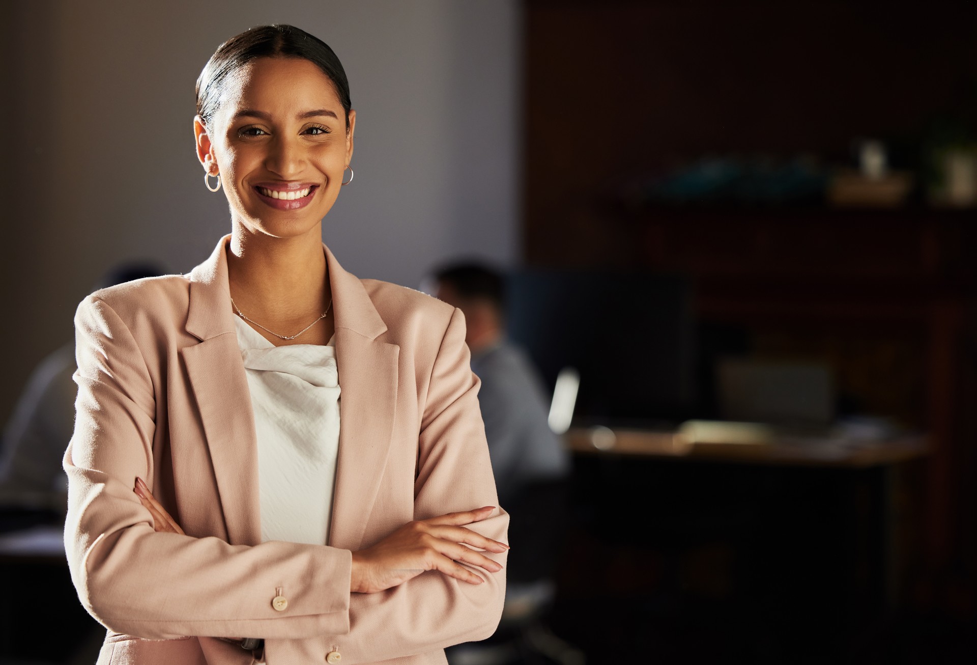 Business woman, portrait and lawyer at a law firm feeling proud of corporate vision. Happiness, smile and employee growth of an Indian person with mock up with professional mindset and success